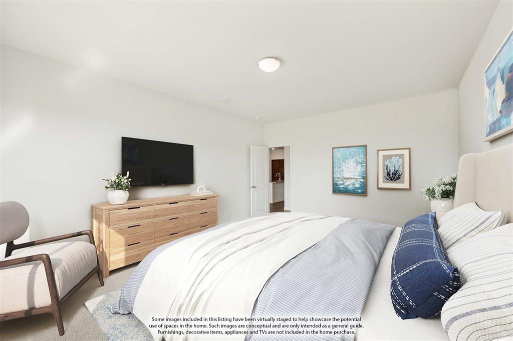4541 Norcross Lane Crowley, TX 76036 - Photo 10 of 20 a bedroom with a bed and a flat screen tv