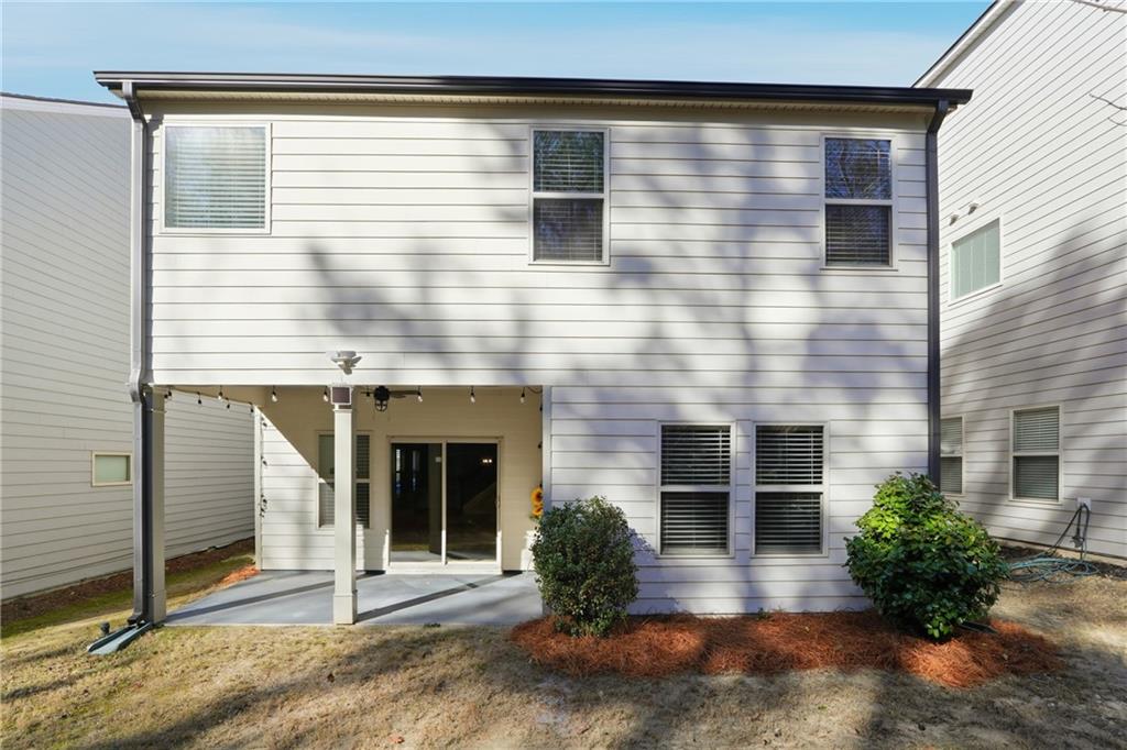 2779 Morgan Spring Trail Buford, GA 30519 - Photo 51 of 64 a front view of a house with a yard