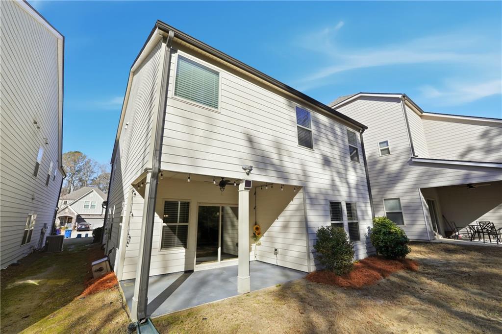 2779 Morgan Spring Trail Buford, GA 30519 - Photo 56 of 64 a view of a house with a patio