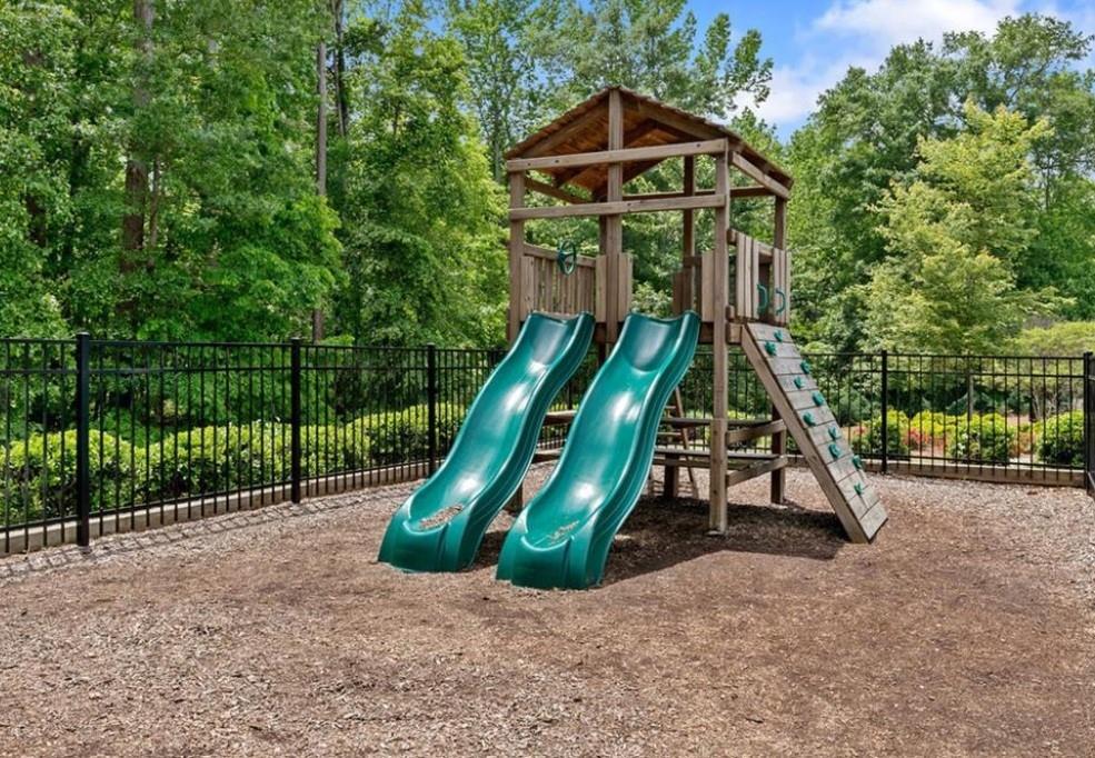 2779 Morgan Spring Trail Buford, GA 30519 - Photo 63 of 64 a view of a park with slide