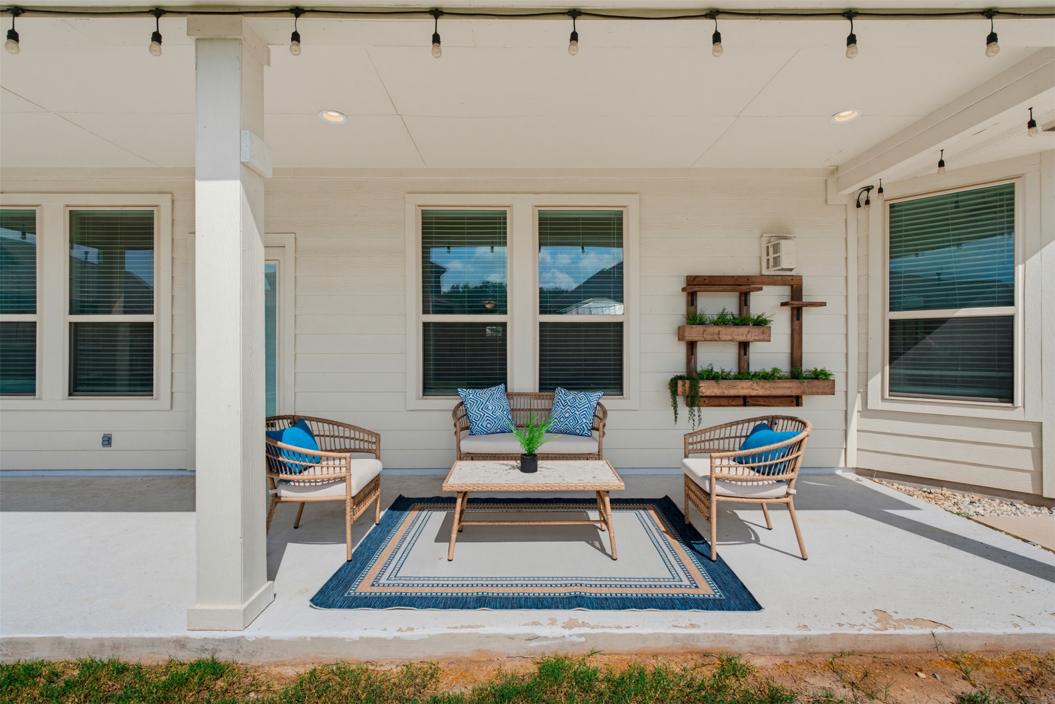 12613 Twisted Root Drive Manchaca, TX 78652 - Photo 17 of 33 Unwind in comfort on this spacious outdoor patio, ideal for peaceful relaxation and entertaining.
