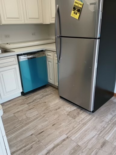 6823 Roberts Road Bridgeview, IL 60455 - Photo 21 of 22 a kitchen with a refrigerator and microwave