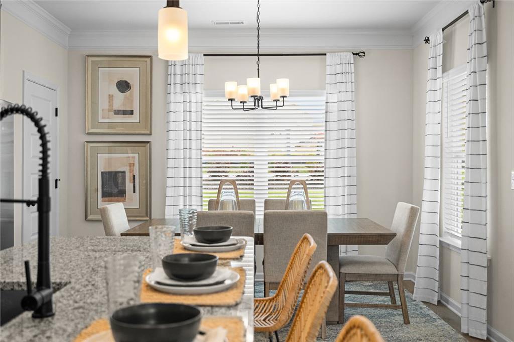 132 Andros Loop Dalton, GA 30721 - Photo 20 of 40 a dining room with furniture and window