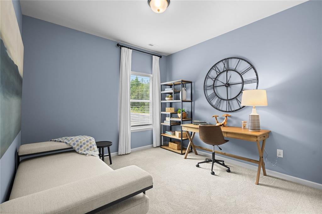 132 Andros Loop Dalton, GA 30721 - Photo 31 of 40 a living room with furniture a rug and a window