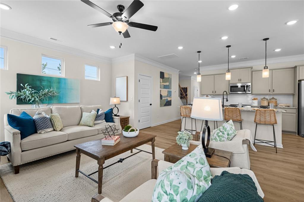 132 Andros Loop Dalton, GA 30721 - Photo 7 of 40 a living room with furniture and kitchen view