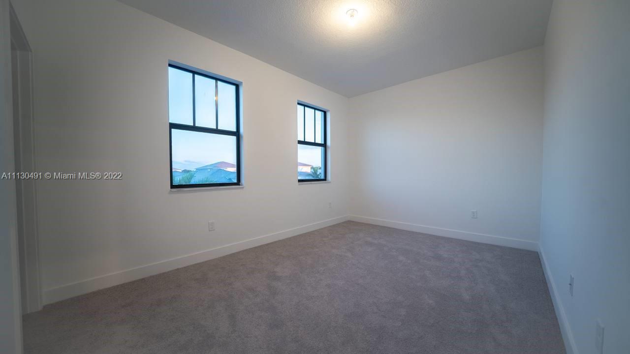 Sunset Lakes Miramar, FL 33029 - Photo 15 of 15 an empty room with windows