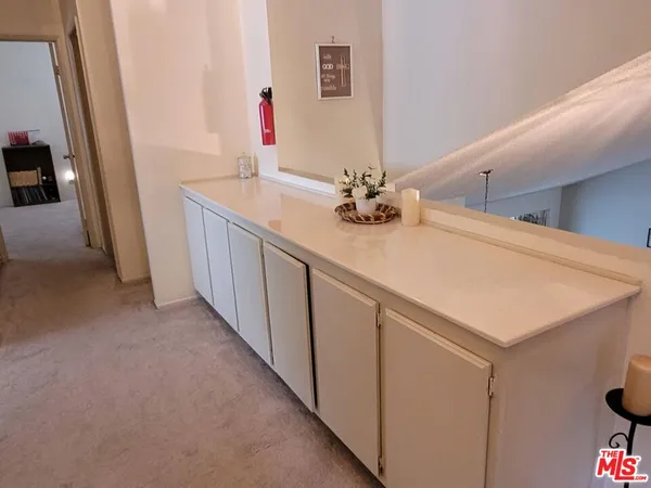 a view of hallway with livingroom and bedroom