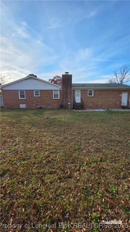 3023 Rouse Road Fayetteville, NC 28306 - Photo 2 of 12 a view of a house with a yard