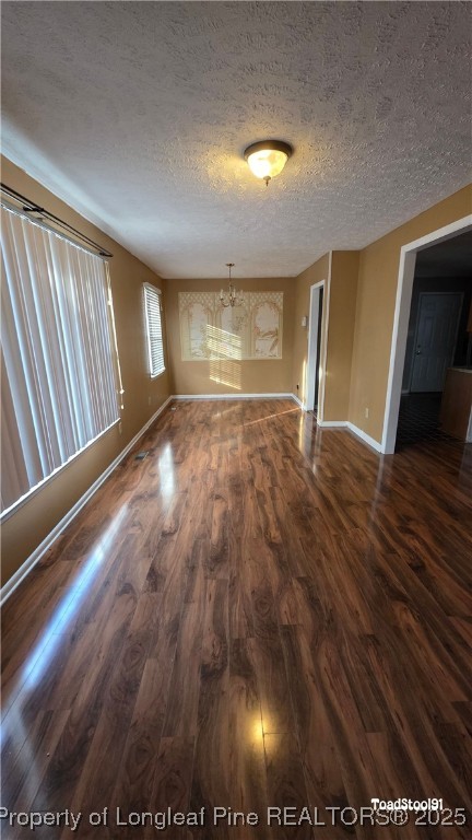 3023 Rouse Road Fayetteville, NC 28306 - Photo 3 of 12 a view of room with window and wooden floor