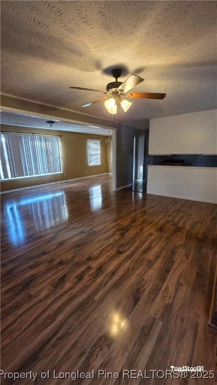 3023 Rouse Road Fayetteville, NC 28306 - Photo 5 of 12 a view of an empty room with wooden floor and a window