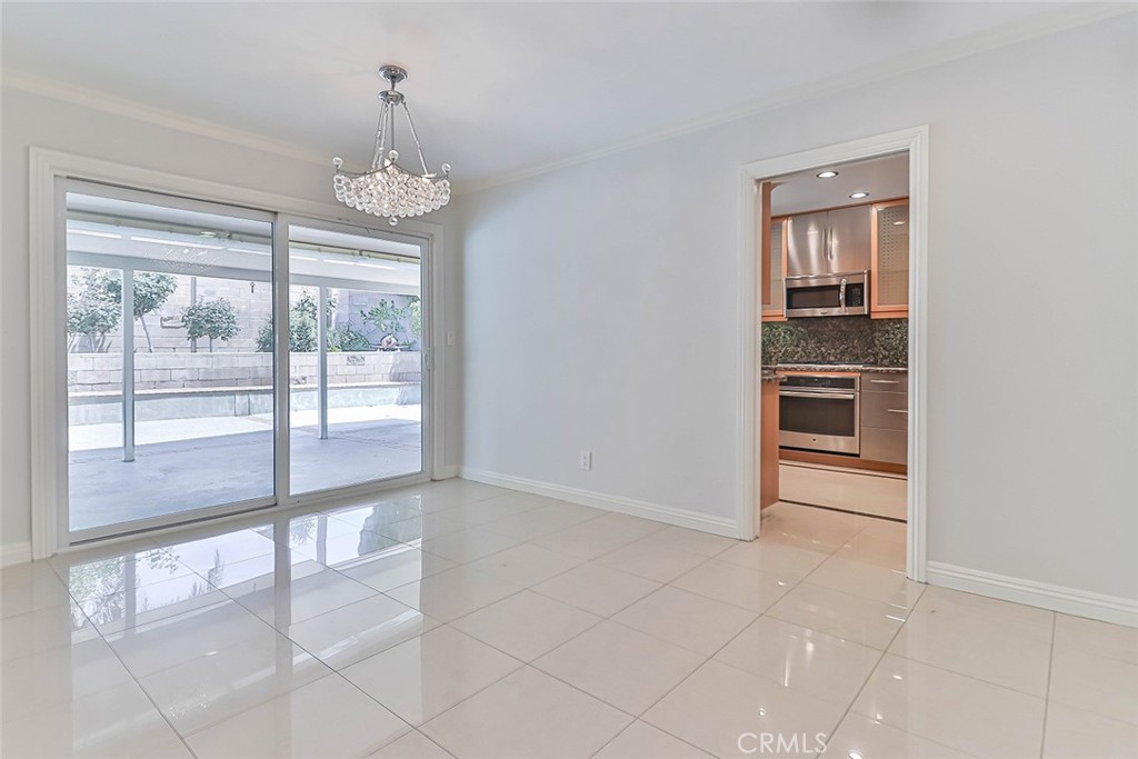 19051 Los Alimos Street Porter Ranch, CA 91326 - Photo 14 of 59 a view of an empty room with a window