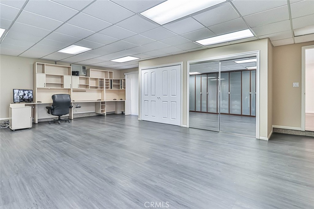 19051 Los Alimos Street Porter Ranch, CA 91326 - Photo 33 of 59 a view of a livingroom with furniture and cabinet