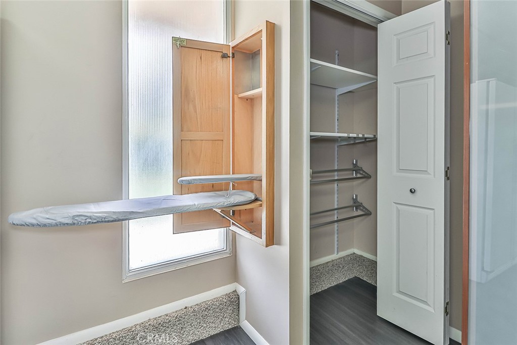 19051 Los Alimos Street Porter Ranch, CA 91326 - Photo 34 of 59 a bathroom with a tub and a window