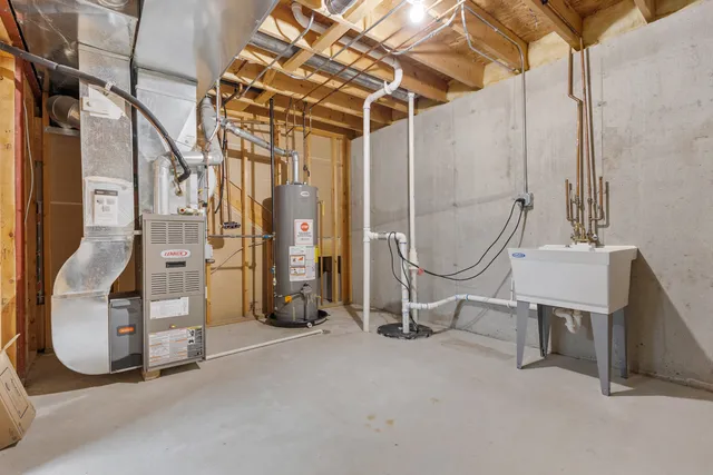 a room with gym equipment and white walls