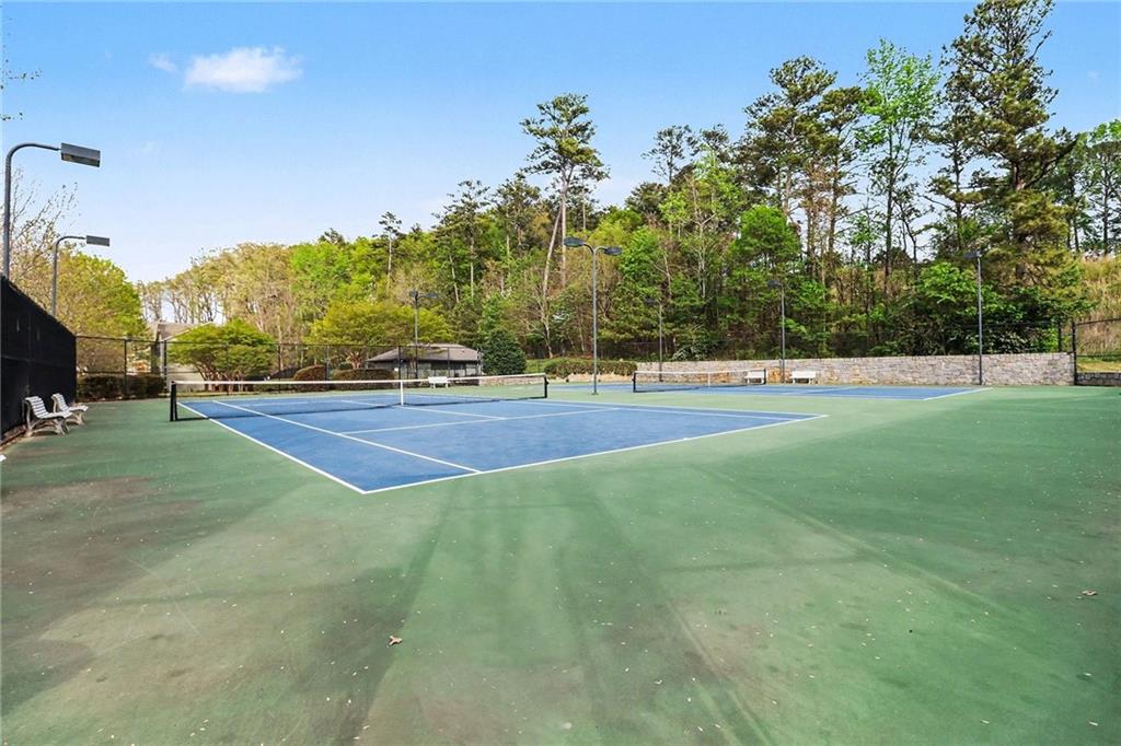 1180 Ridenour Boulevard, Unit 5 Kennesaw, GA 30152 - Photo 20 of 22 a view of an outdoor space and tennis court