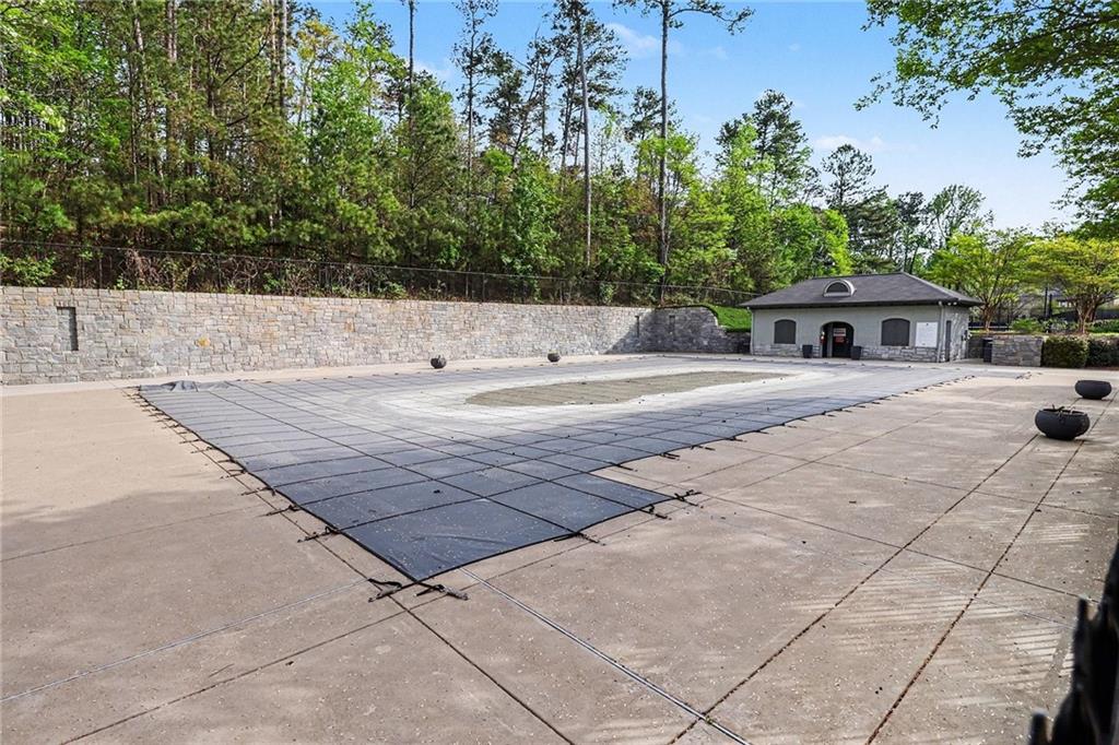 1180 Ridenour Boulevard, Unit 5 Kennesaw, GA 30152 - Photo 21 of 22 a view of a backyard of the house