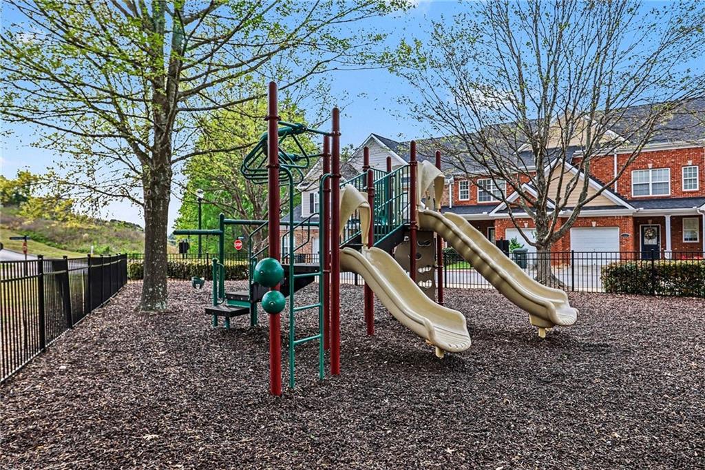 1180 Ridenour Boulevard, Unit 5 Kennesaw, GA 30152 - Photo 22 of 22 a view of a park with a bench
