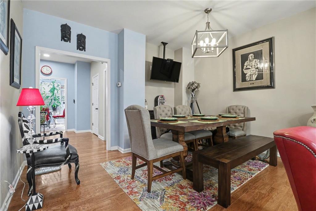 1180 Ridenour Boulevard, Unit 5 Kennesaw, GA 30152 - Photo 5 of 22 a view of a dining room with furniture