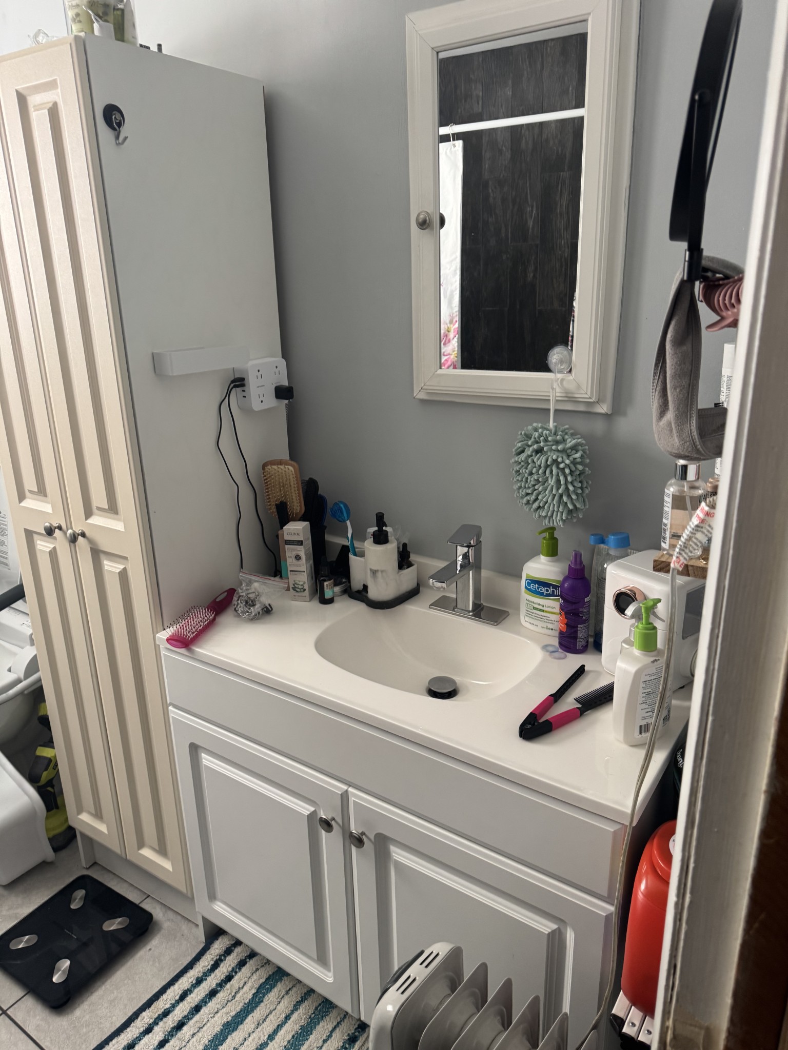 611 Estes Street Smithville, TN 37166 - Photo 6 of 9 a bathroom with a sink and a mirror