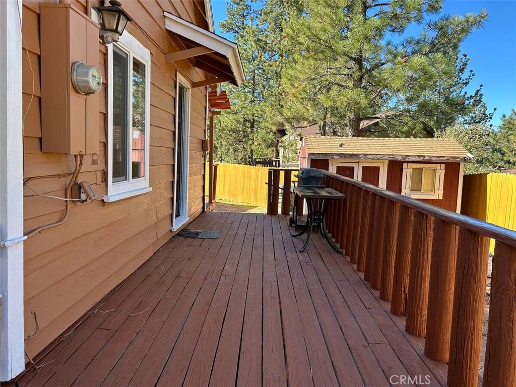 542 Highland Lane Big Bear Lake, CA 92315 - Photo 3 of 8 a view of a house with wooden deck