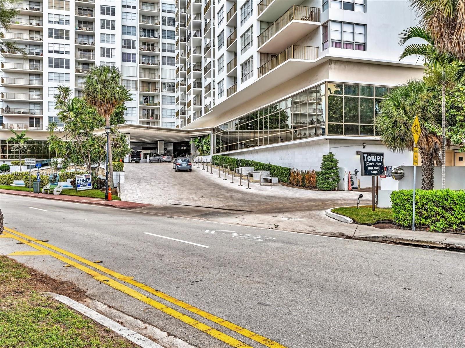4101 Pine Tree Drive, Unit 621 620 Miami Beach, FL 33140 - Photo 2 of 73 front view of a building and a street