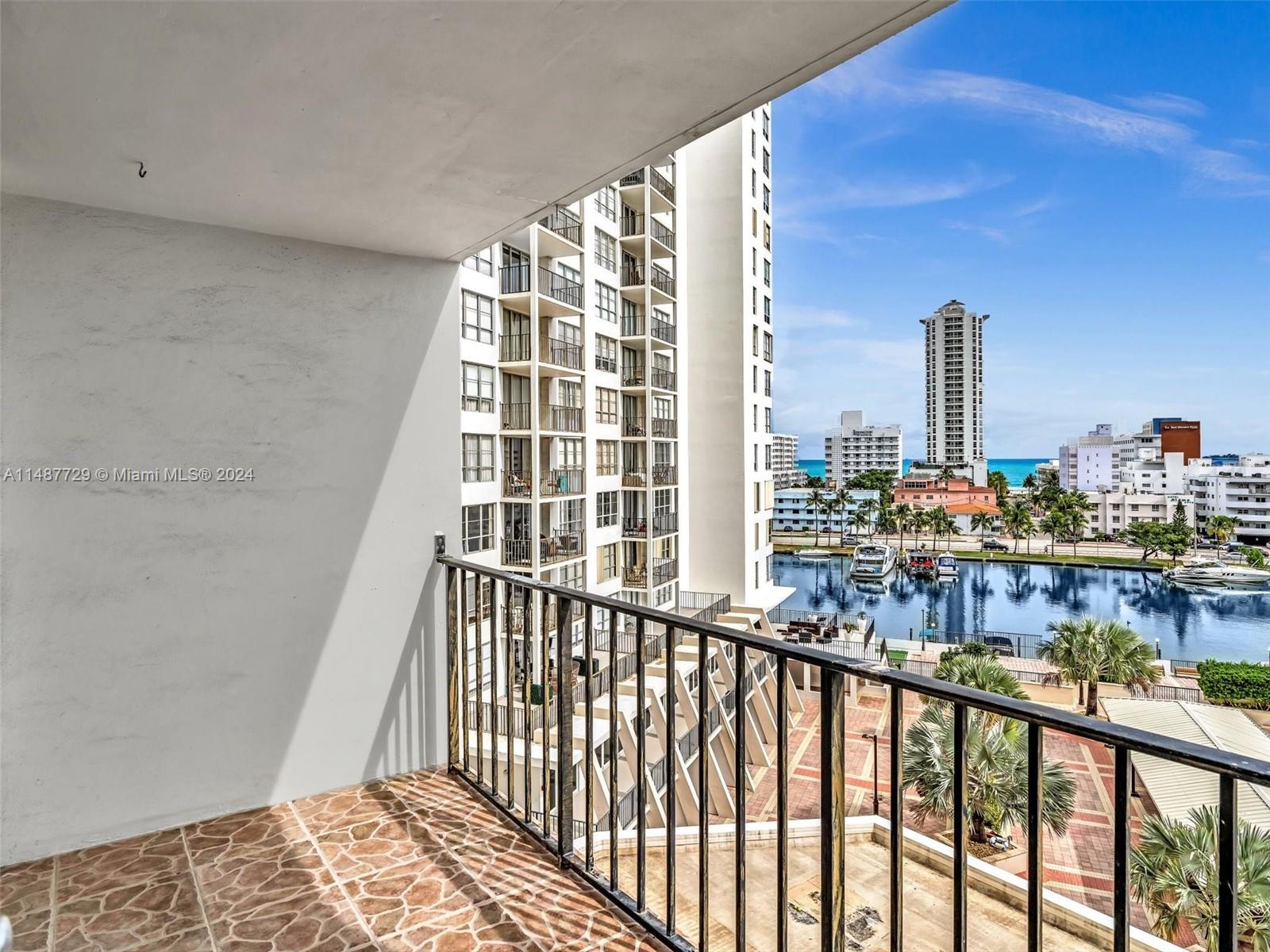 4101 Pine Tree Drive, Unit 621 620 Miami Beach, FL 33140 - Photo 21 of 73 a view of a balcony with city view