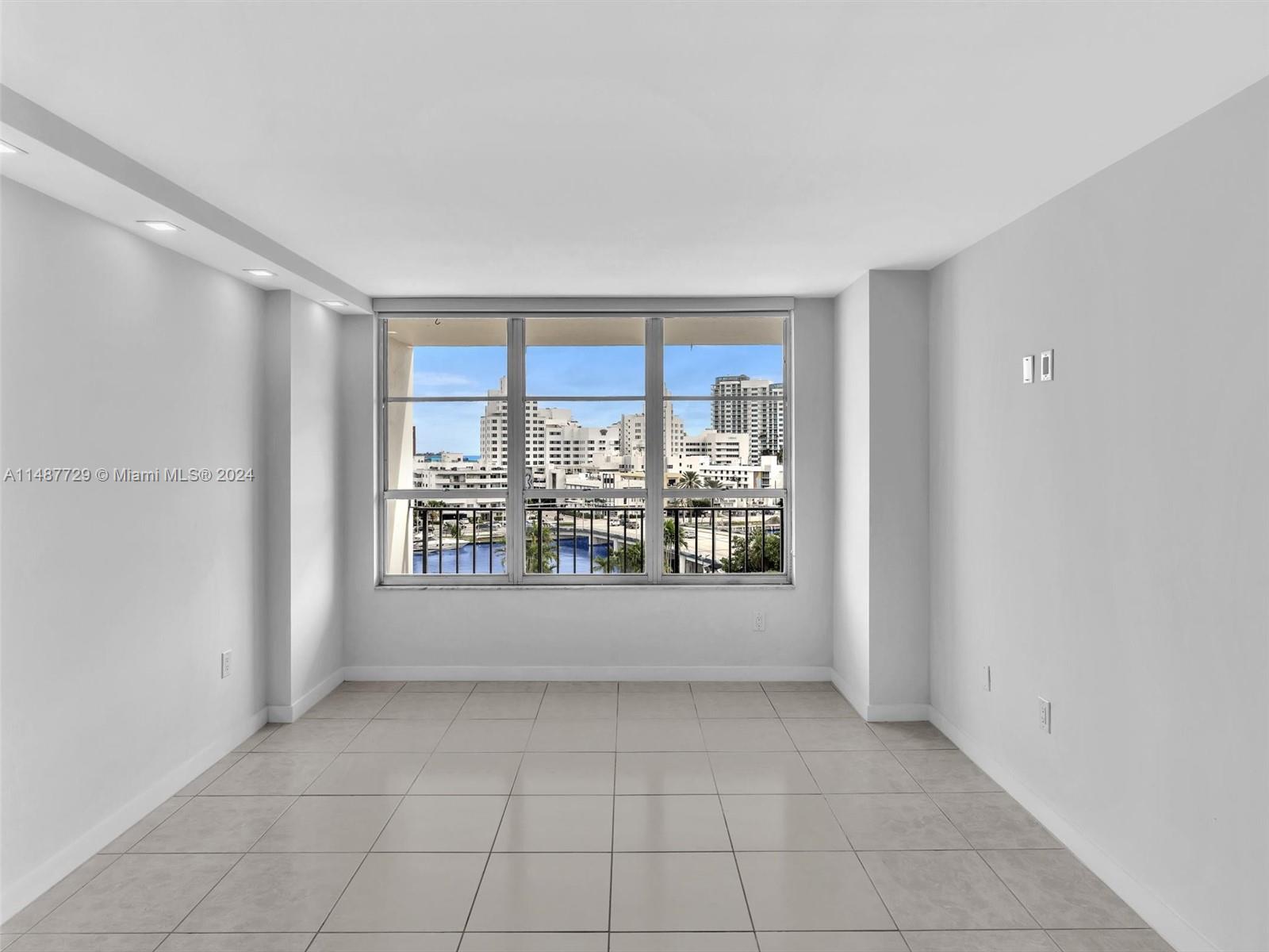 4101 Pine Tree Drive, Unit 621 620 Miami Beach, FL 33140 - Photo 24 of 73 a view of an empty room with a window