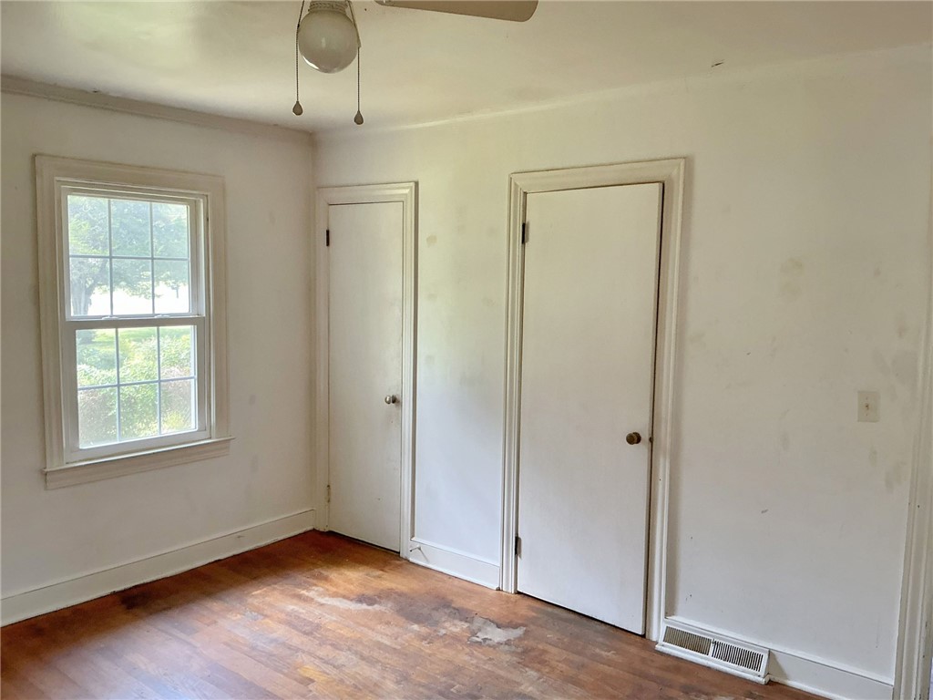 609 West Geer Street Honea Path, SC 29654 - Photo 12 of 12 Hardwood floors and classic trim highlight this space awaiting your custom updates.