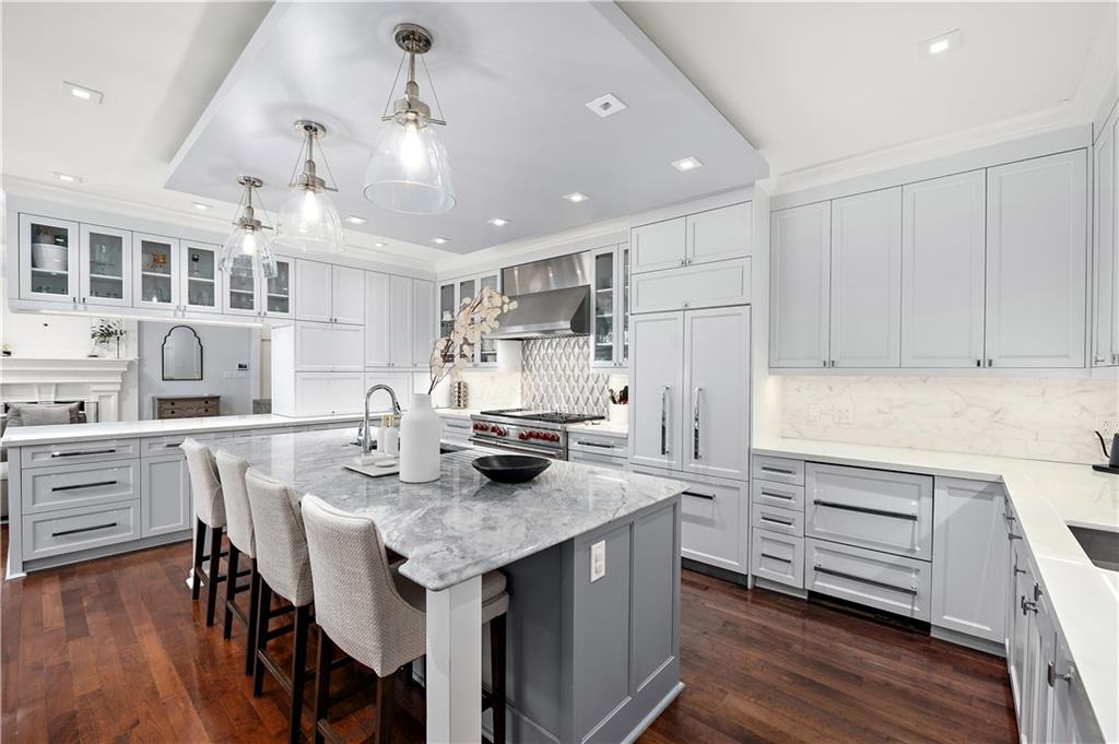 515 Maple Lane Sewickley, PA 15143 - Photo 11 of 42 a kitchen with white cabinets and stainless steel appliances