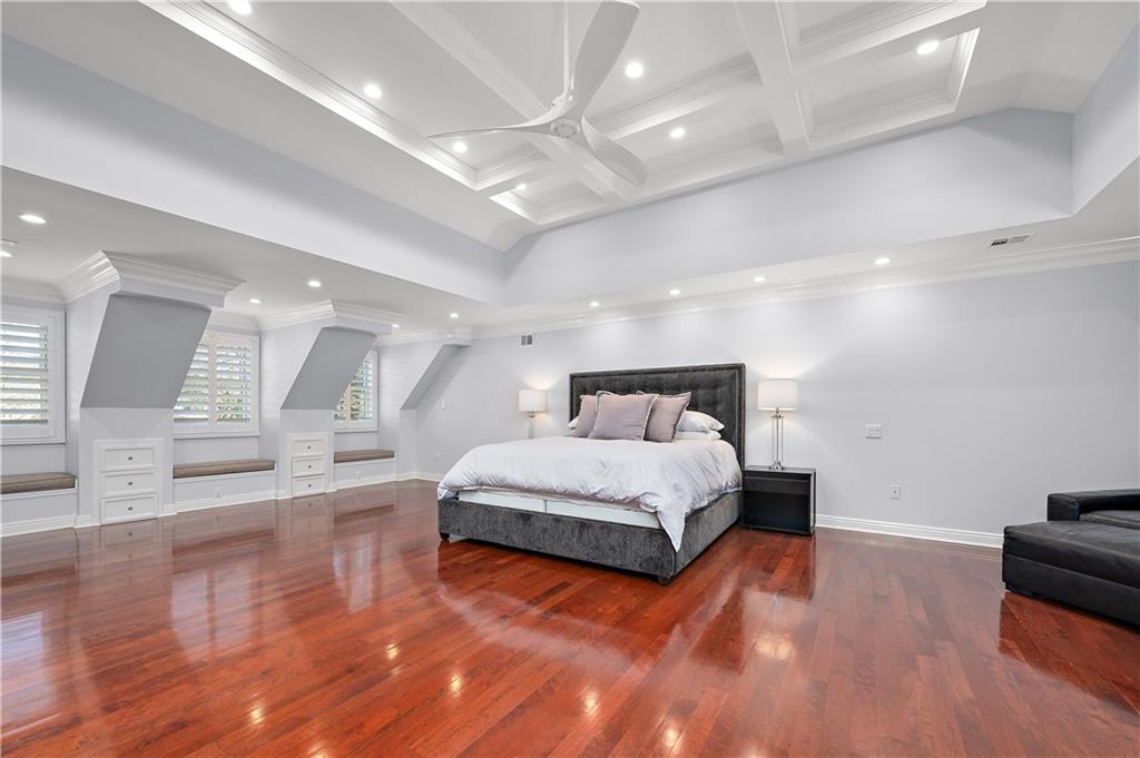 515 Maple Lane Sewickley, PA 15143 - Photo 24 of 42 a spacious bedroom with a bed and a view of kitchen