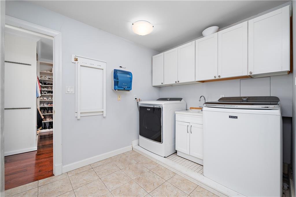 515 Maple Lane Sewickley, PA 15143 - Photo 30 of 42 a kitchen with cabinets and white appliances