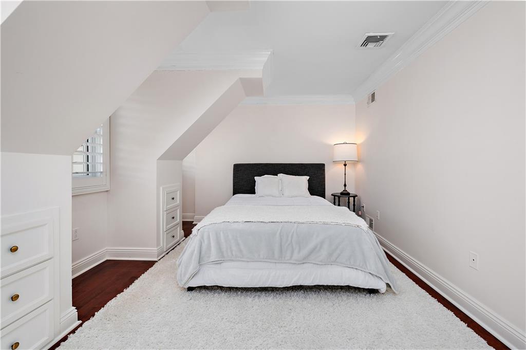 515 Maple Lane Sewickley, PA 15143 - Photo 32 of 42 a bedroom with a bed and wooden floor