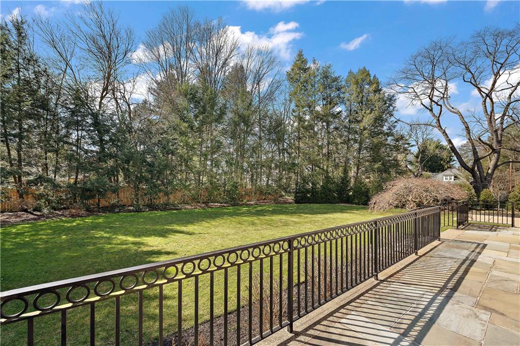 515 Maple Lane Sewickley, PA 15143 - Photo 41 of 42 a view of a balcony with wooden floor and fence