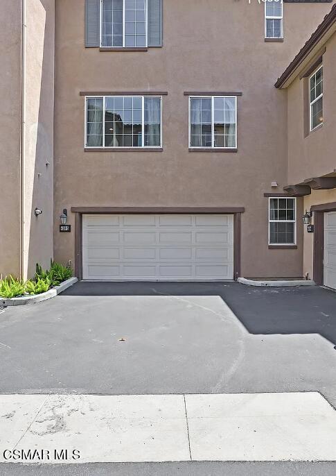 458 Stratus Lane, Unit 5 Simi Valley, CA 93065 - Photo 13 of 13 a front view of a house