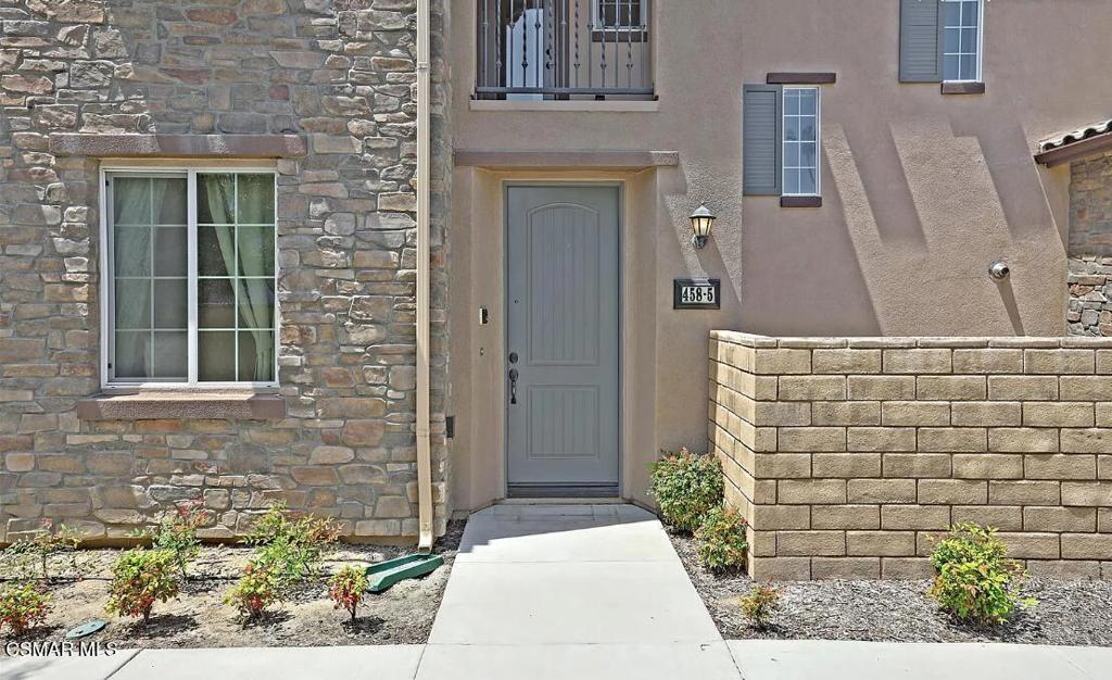458 Stratus Lane, Unit 5 Simi Valley, CA 93065 - Photo 2 of 13 a front view of a house