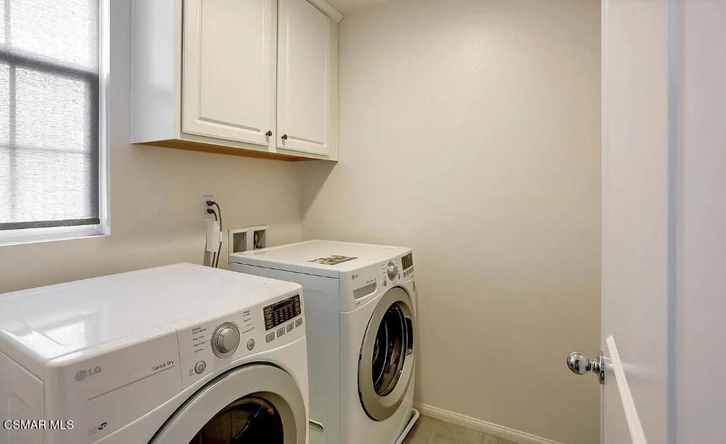 458 Stratus Lane, Unit 5 Simi Valley, CA 93065 - Photo 6 of 13 a utility room with dryer and washer