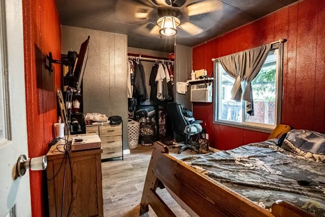 a bed room with a bed and furniture