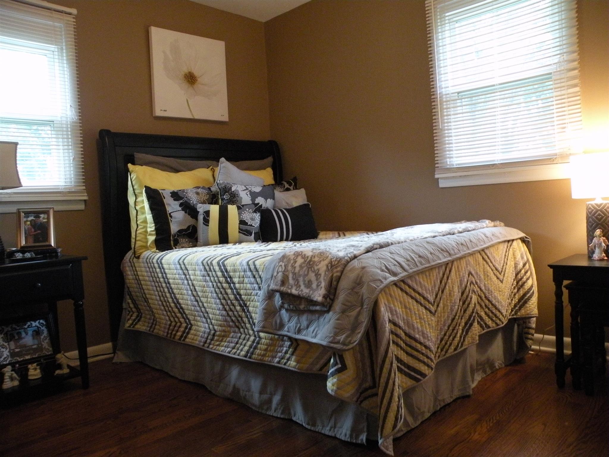 301 Fowler Ford Road Portland, TN 37148 - Photo 14 of 22 a bed sitting in a bedroom next to a window