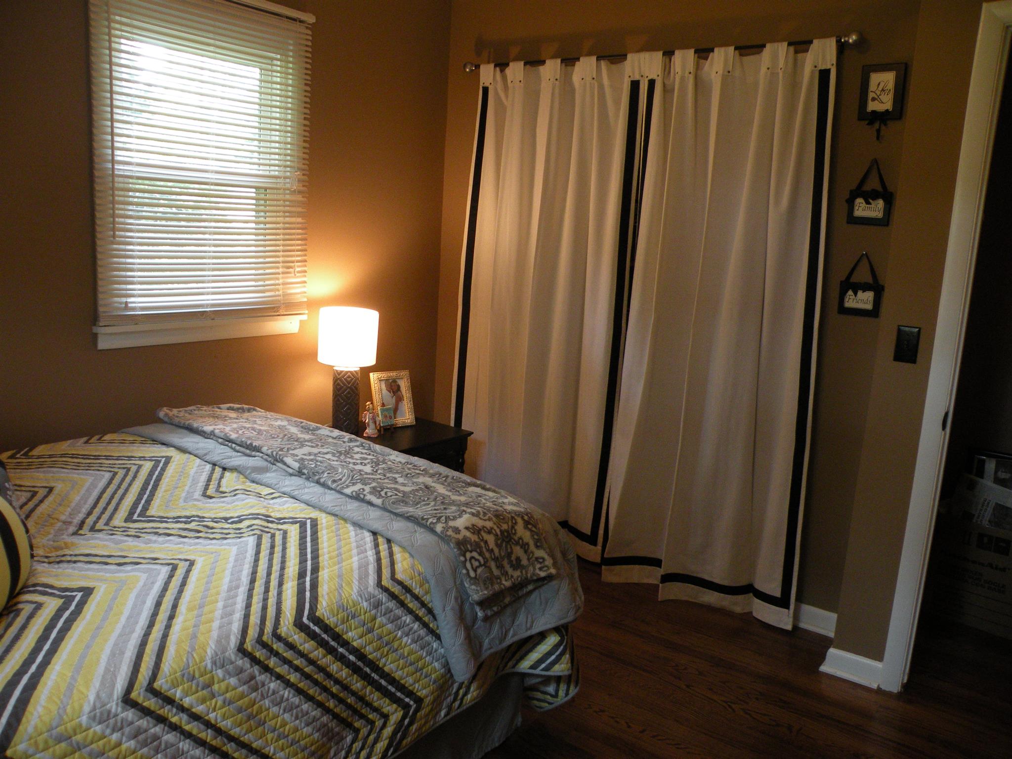 301 Fowler Ford Road Portland, TN 37148 - Photo 16 of 22 a bedroom with a bed and a window