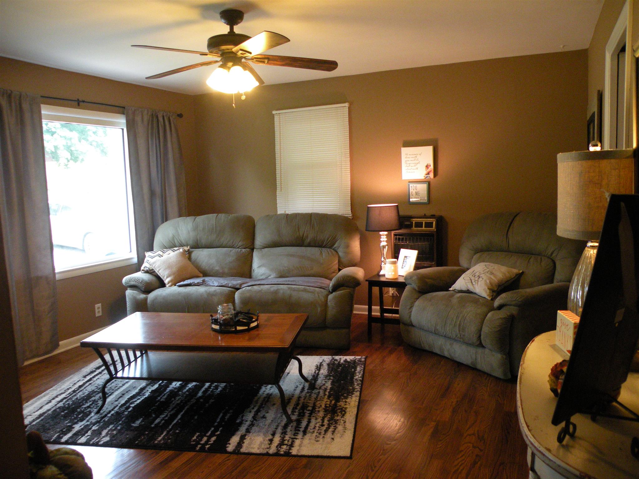 301 Fowler Ford Road Portland, TN 37148 - Photo 5 of 22 a living room with furniture a chandelier and a window