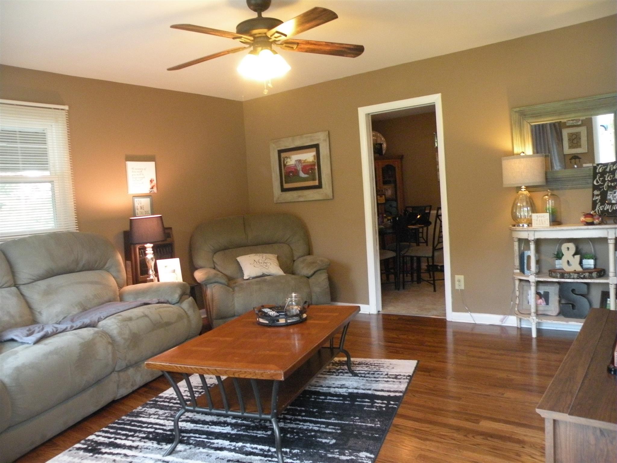 301 Fowler Ford Road Portland, TN 37148 - Photo 6 of 22 a living room with furniture and wooden floor