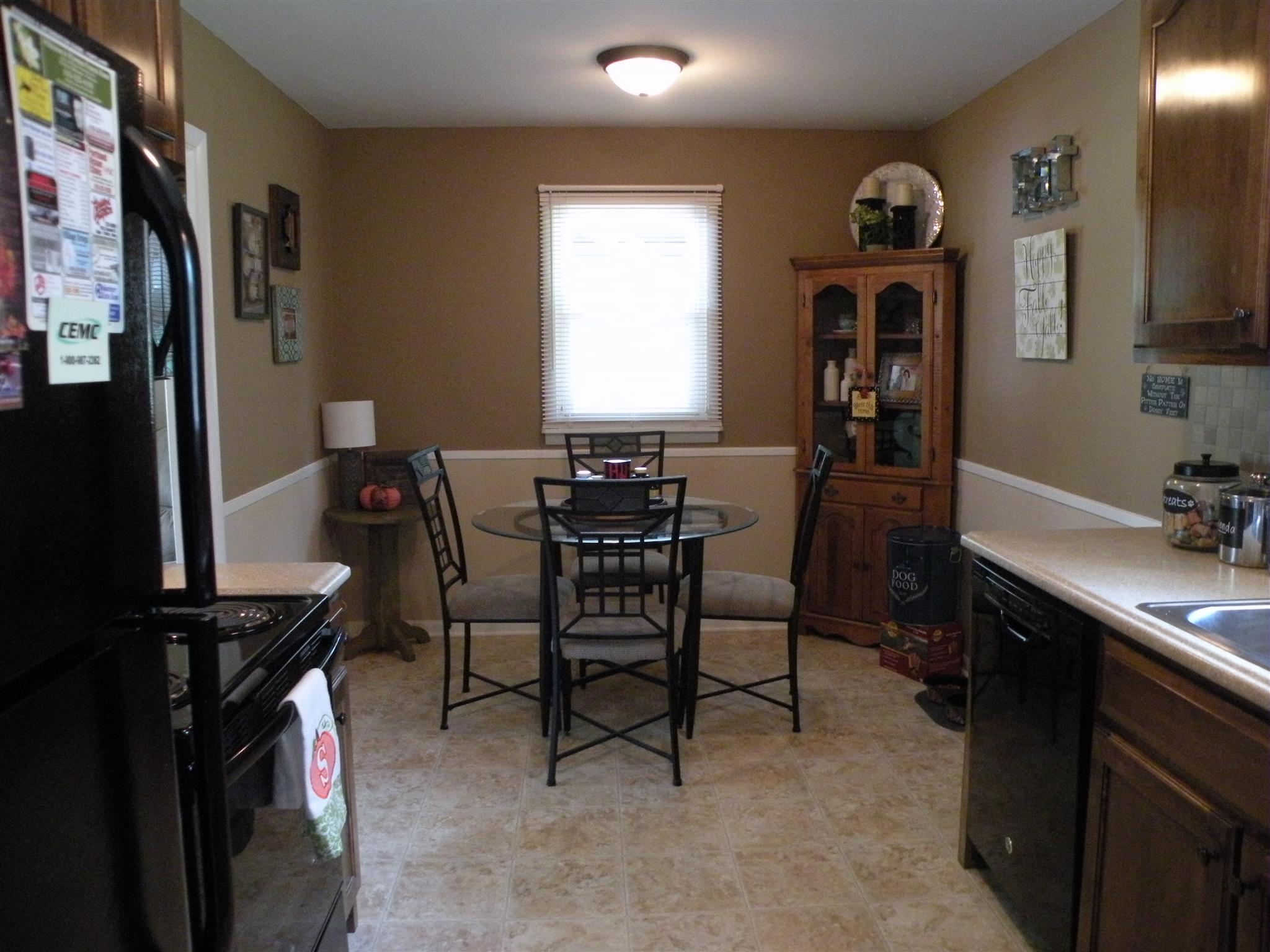 301 Fowler Ford Road Portland, TN 37148 - Photo 8 of 22 a view of a workspace with furniture and a window