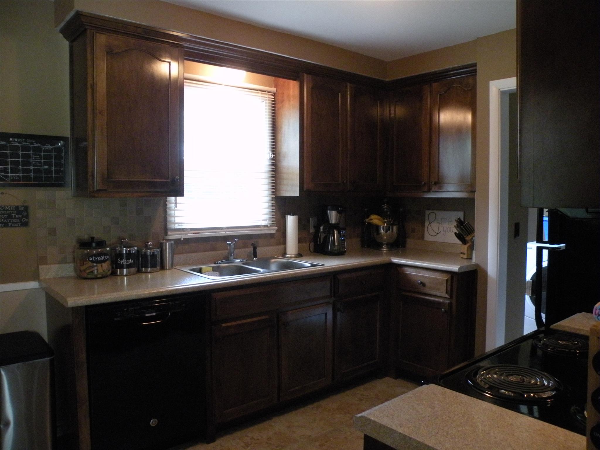 301 Fowler Ford Road Portland, TN 37148 - Photo 9 of 22 a kitchen with a sink stove and refrigerator