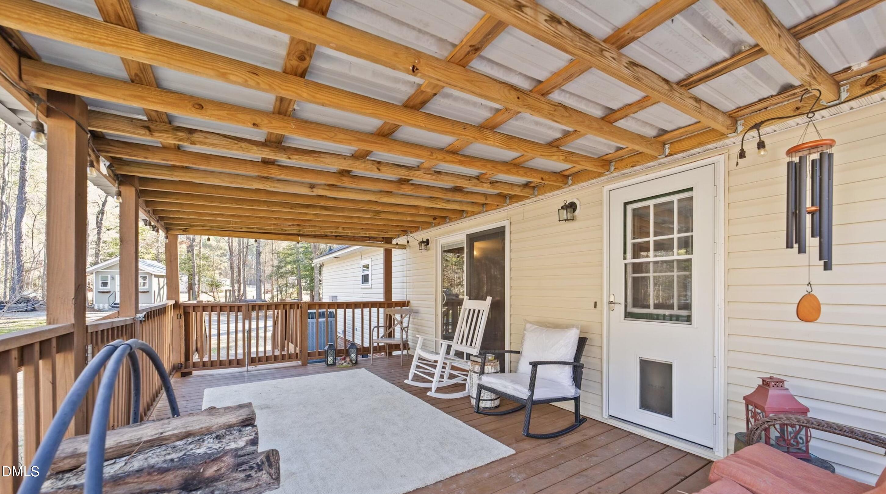 2465 Shoeheel Road Selma, NC 27576 - Photo 20 of 36 a view of a livingroom with furniture wooden floor and windows