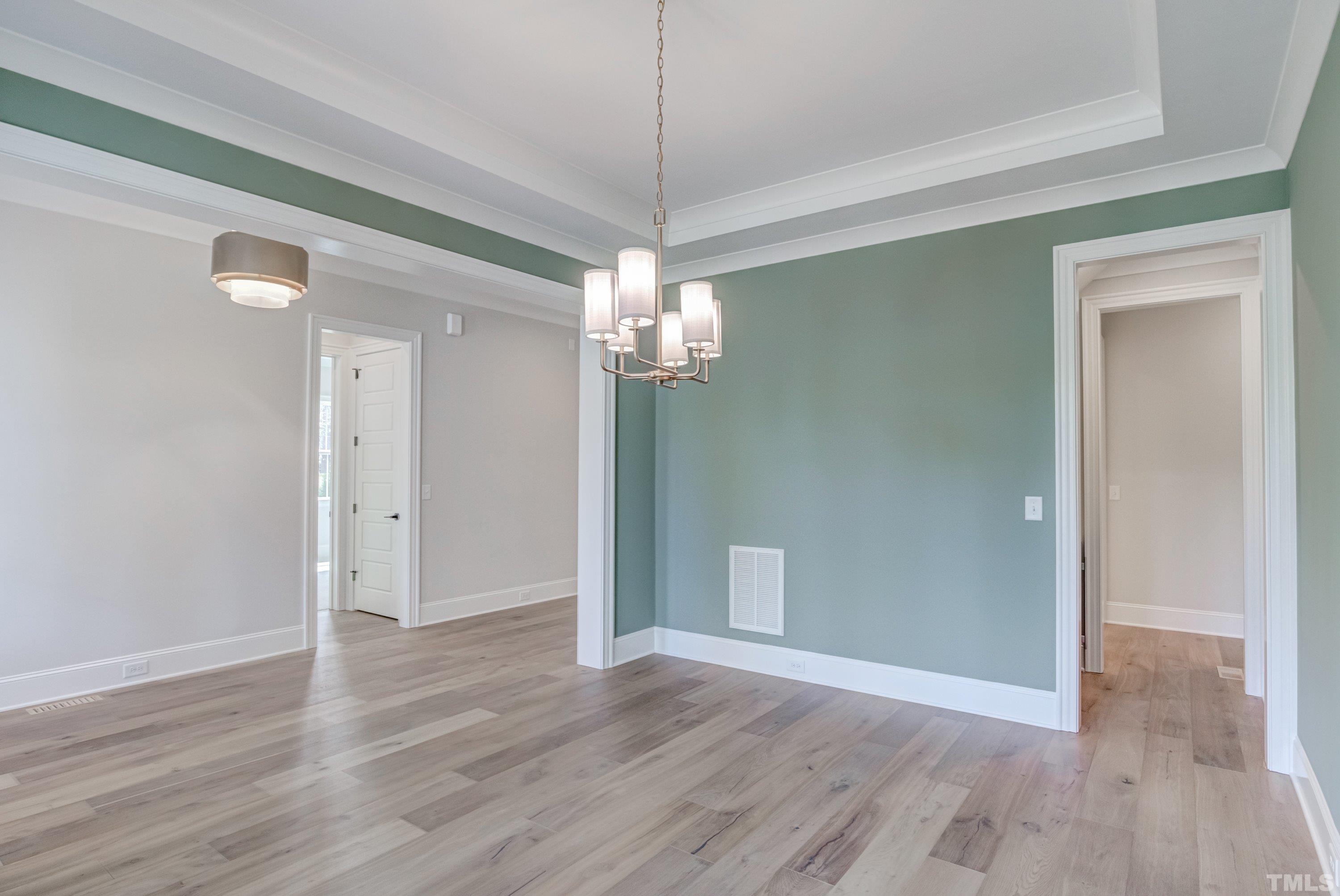 2921 Mt Vernon Church Road Raleigh, NC 27613 - Photo 8 of 57 a view of a livingroom with wooden floor