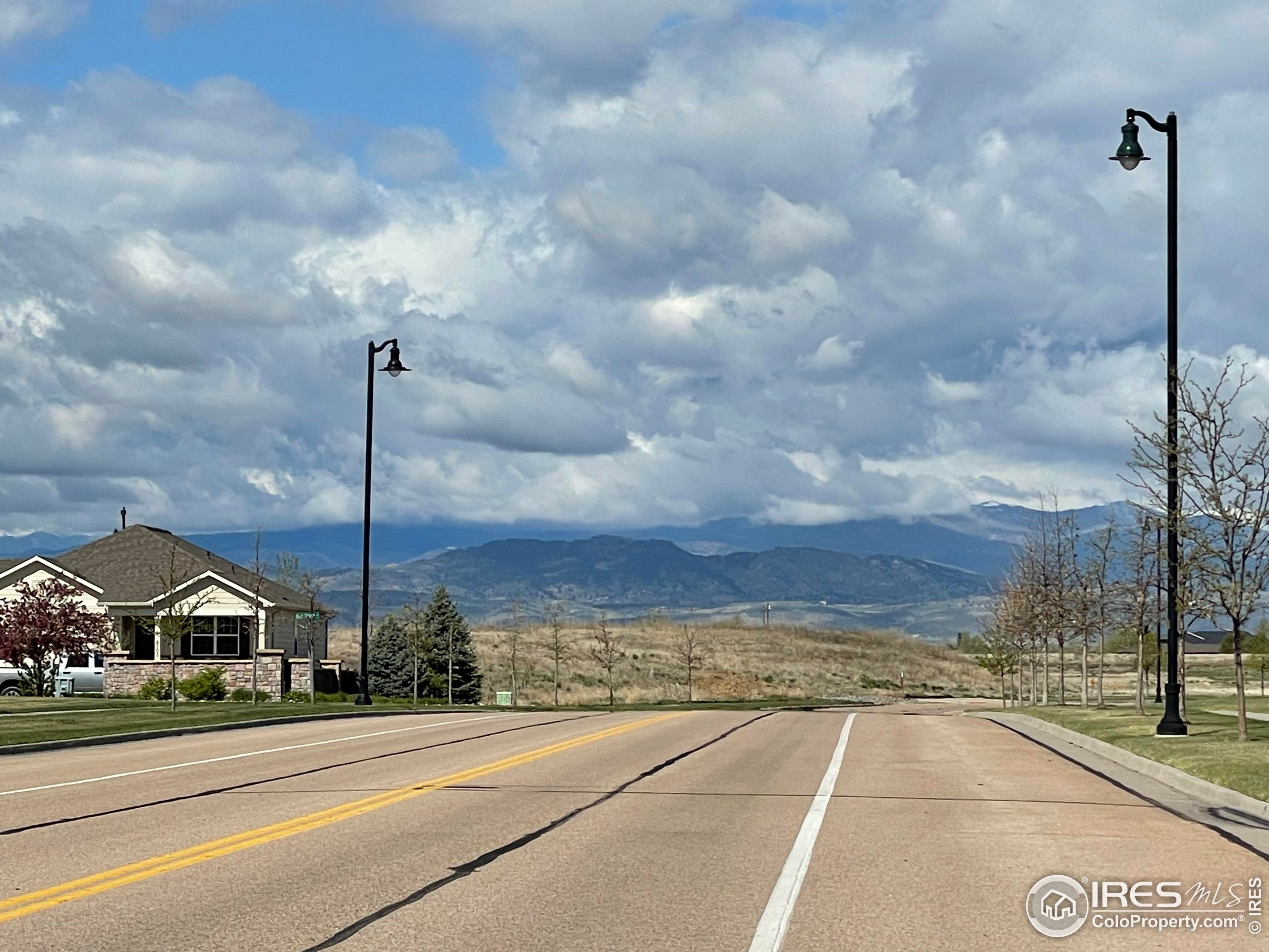 6747 Grainery Road Timnath, CO 80547 - Photo 36 of 42 a view of a terrace with a yard
