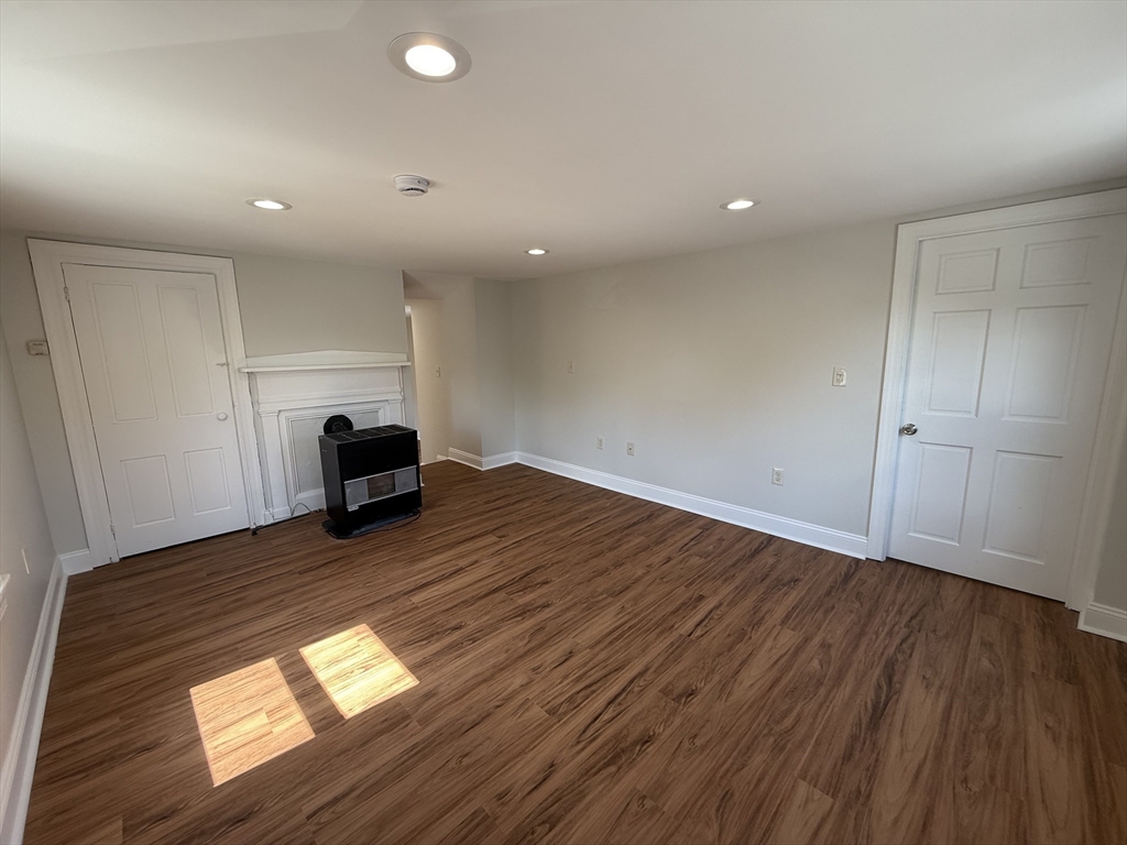 3 Mill Street Shirley, MA 01464 - Photo 19 of 27 a view of empty room with wooden floor and window