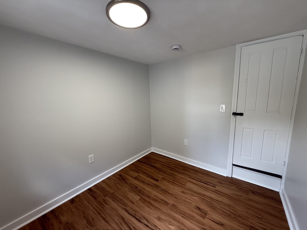 3 Mill Street Shirley, MA 01464 - Photo 21 of 27 a view of a room with wooden floor and white walls