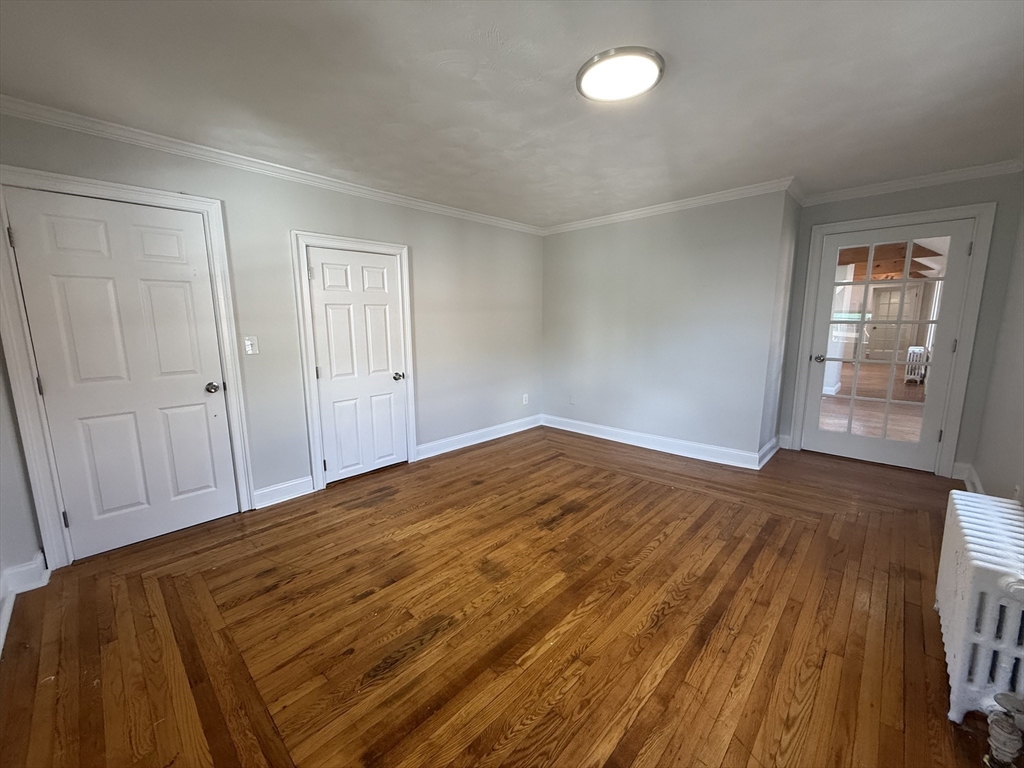 3 Mill Street Shirley, MA 01464 - Photo 3 of 27 a view of empty room with wooden floor and fan