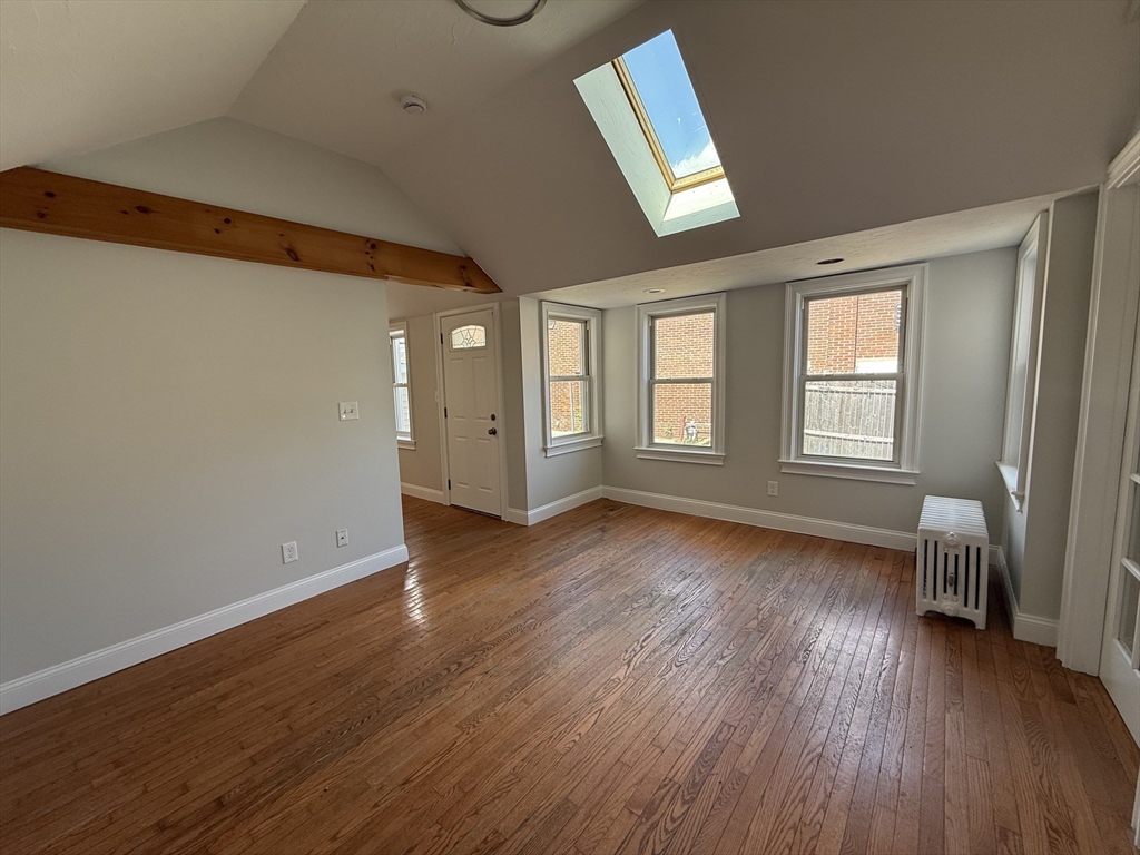 3 Mill Street Shirley, MA 01464 - Photo 5 of 27 an empty room with wooden floor and windows